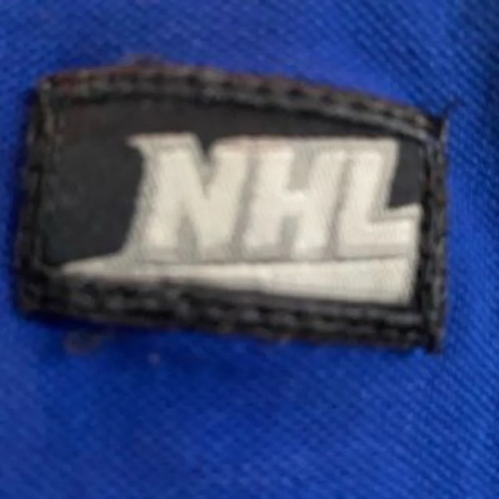 NHL Royal Blue Polo with White Maple Leaf Logo - Picture 4 of 5